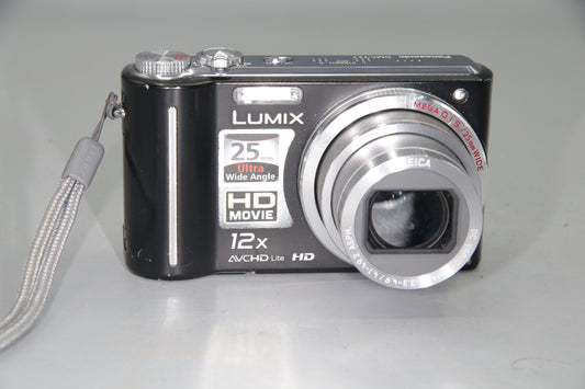 Panasonic Lumix DMC-TZ7 Digital Camera – Works but Marks in Lens