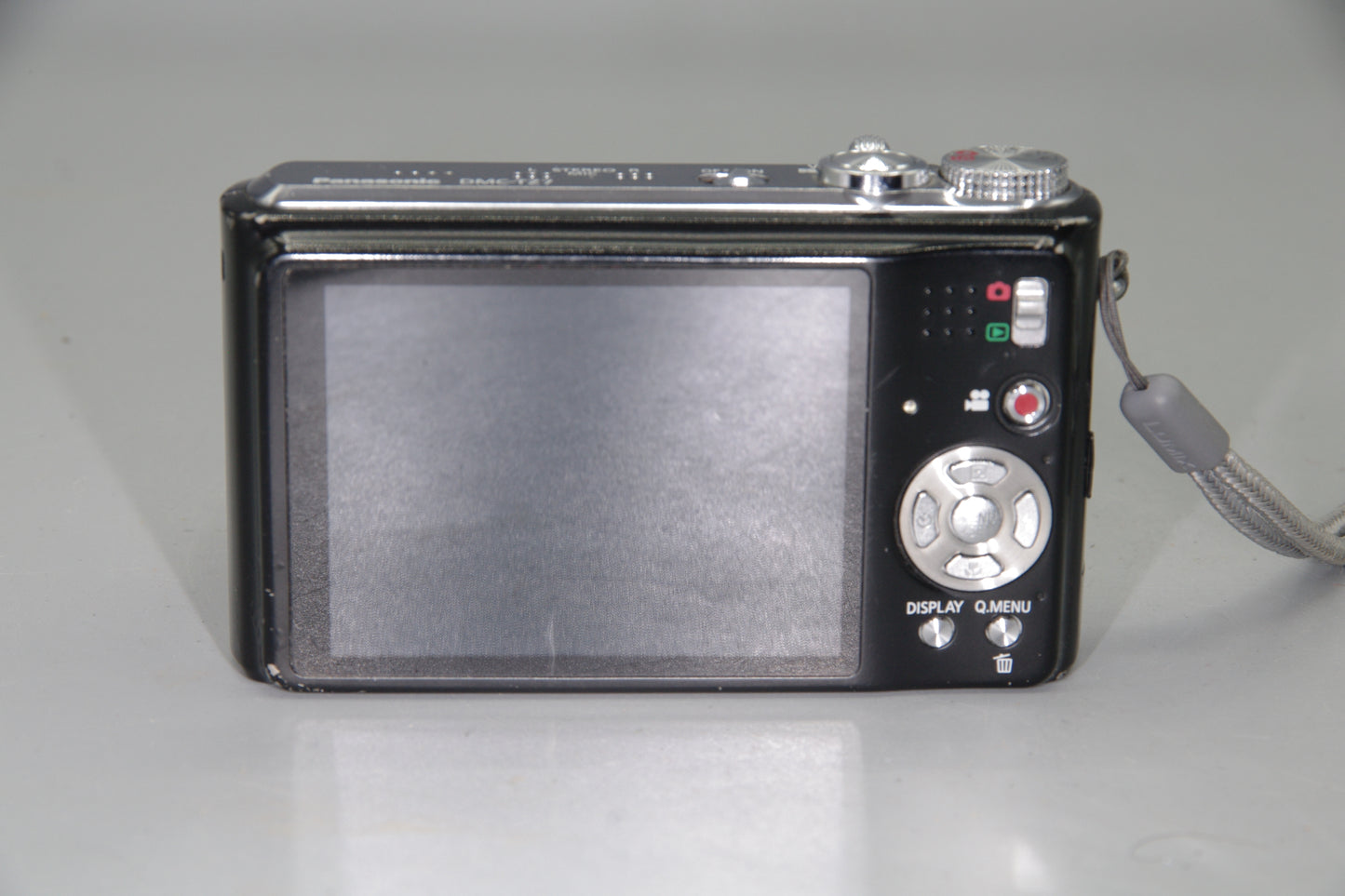 Panasonic Lumix DMC-TZ7 Digital Camera – Works but Marks in Lens