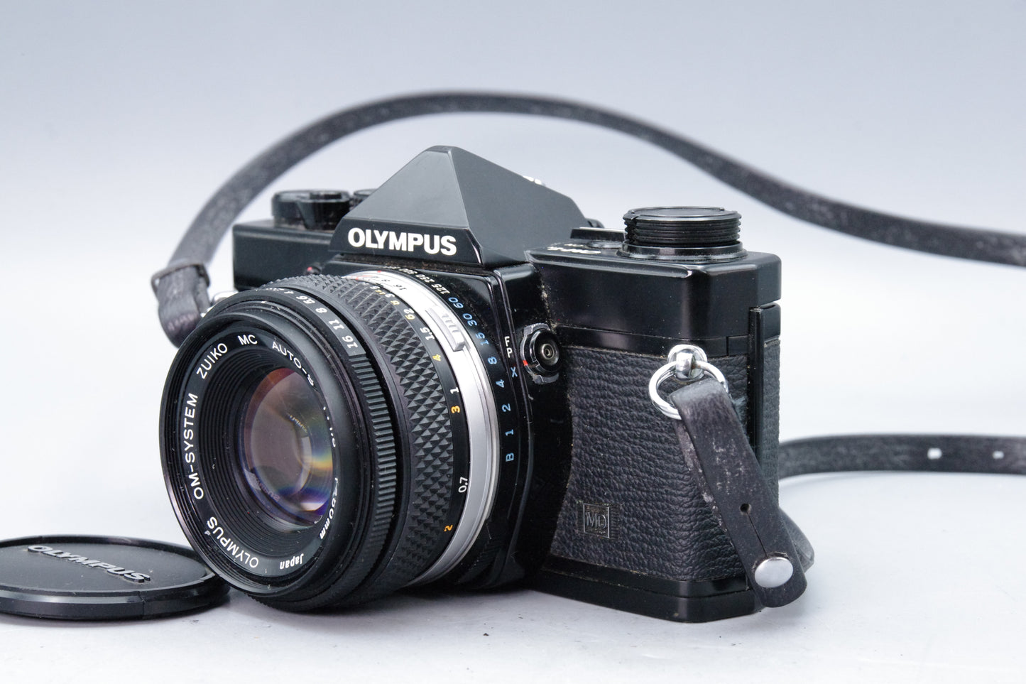 Olympus OM‑1N Black 35mm SLR Film Camera with Zuiko 50mm f/1.8 Lens – Excellent