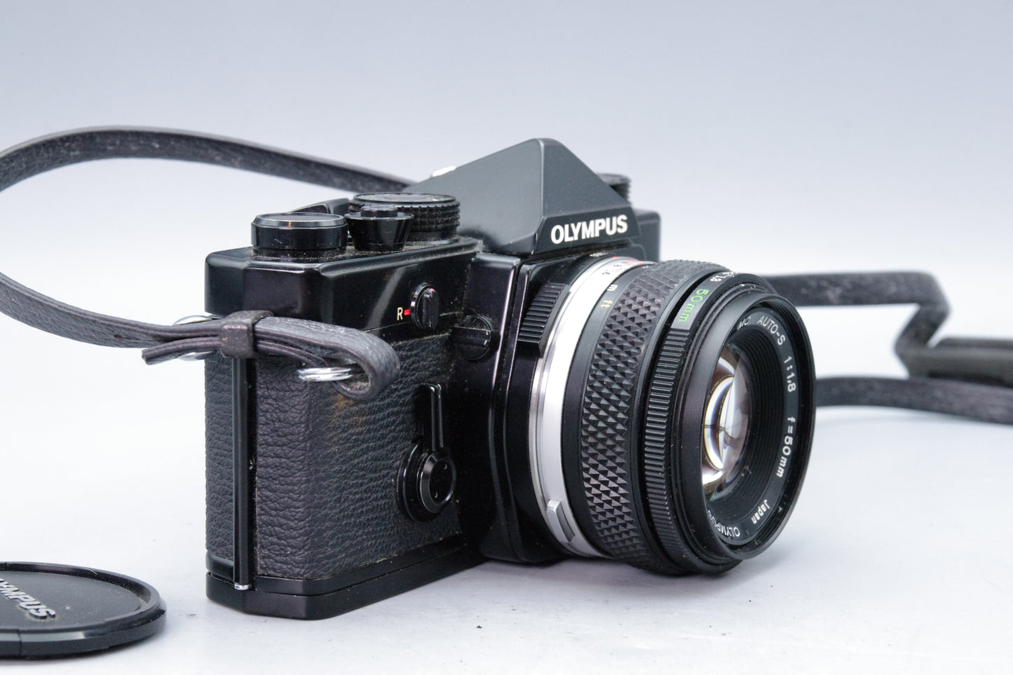 Olympus OM‑1N Black 35mm SLR Film Camera with Zuiko 50mm f/1.8 Lens – Excellent