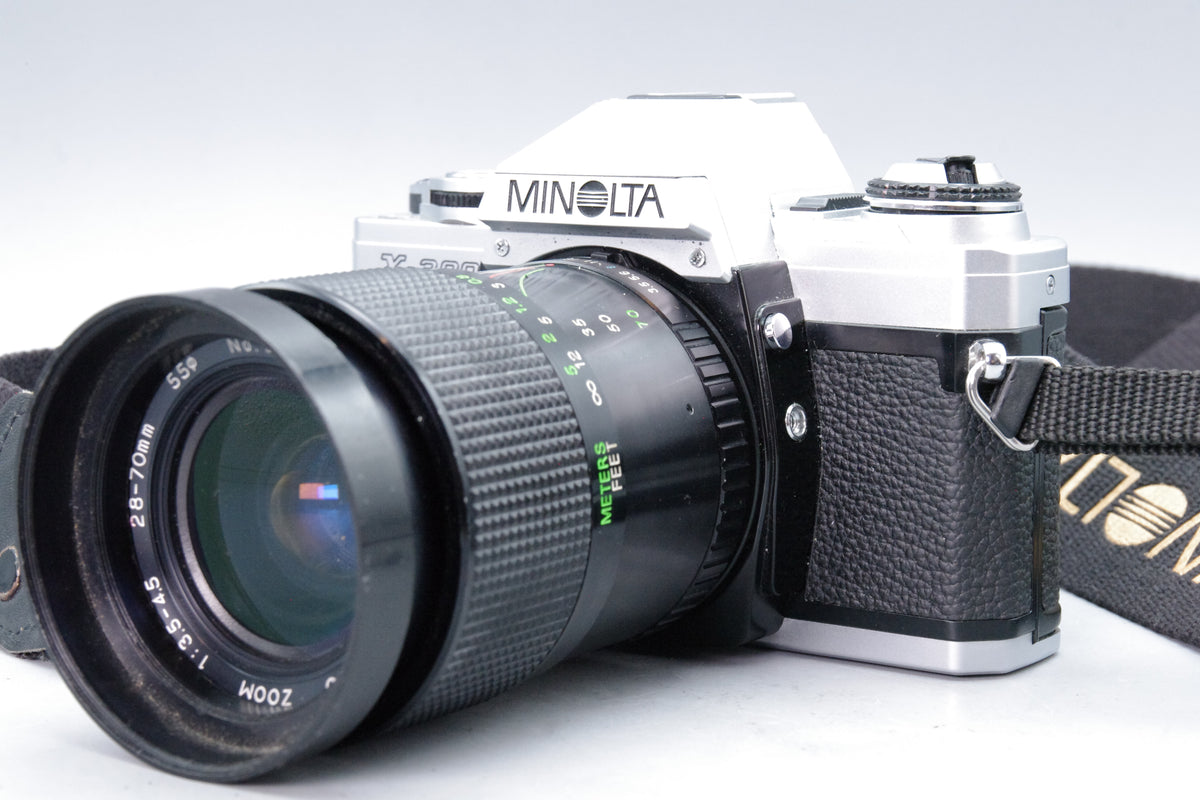 Minolta X‑300 35mm SLR with Centon 28–70mm f/3.5–4.5 Zoom Lens – Excellent