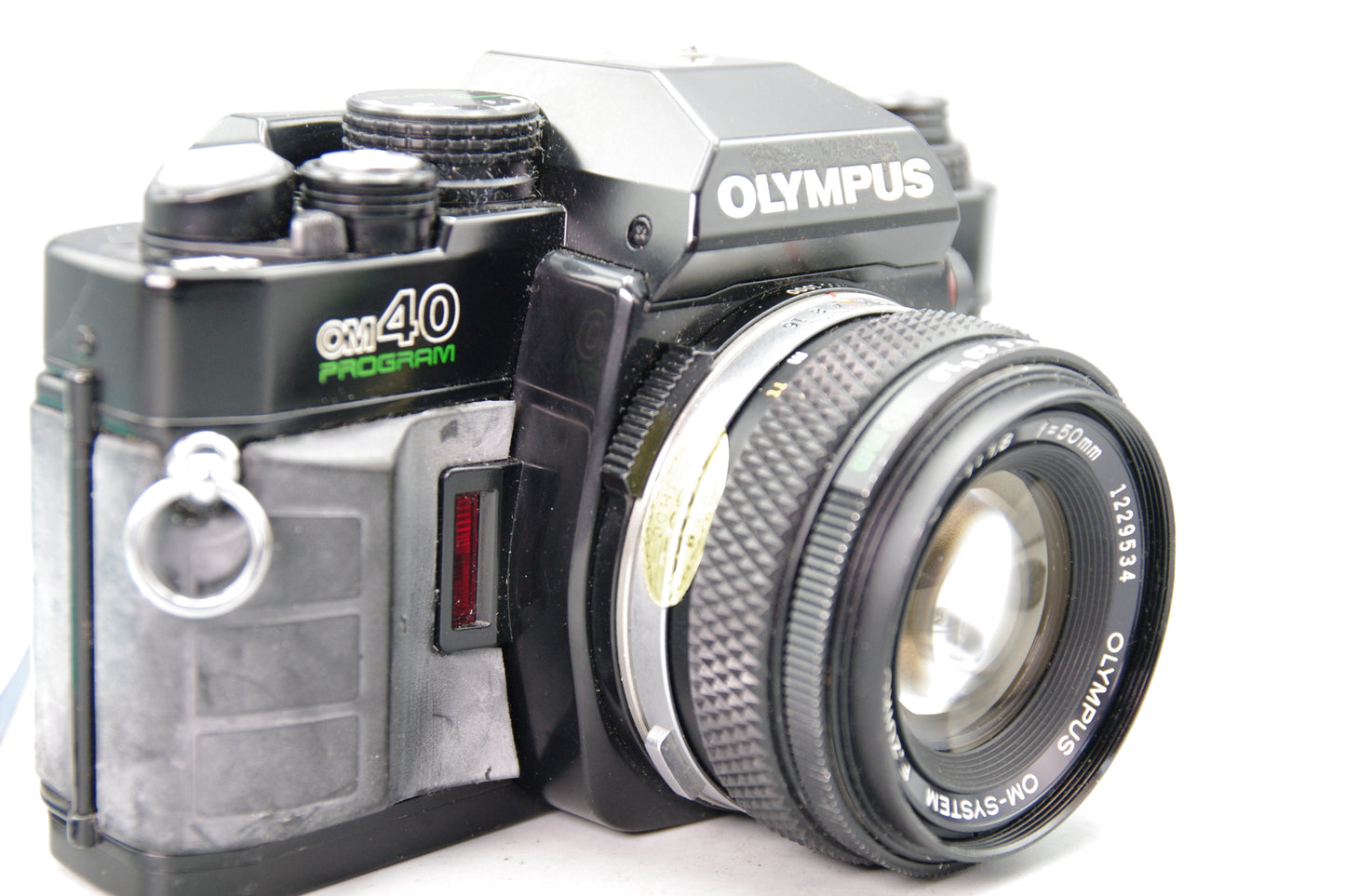 Olympus OM40 Program 35mm SLR Camera with 50mm Lens and Instructions – Very Good
