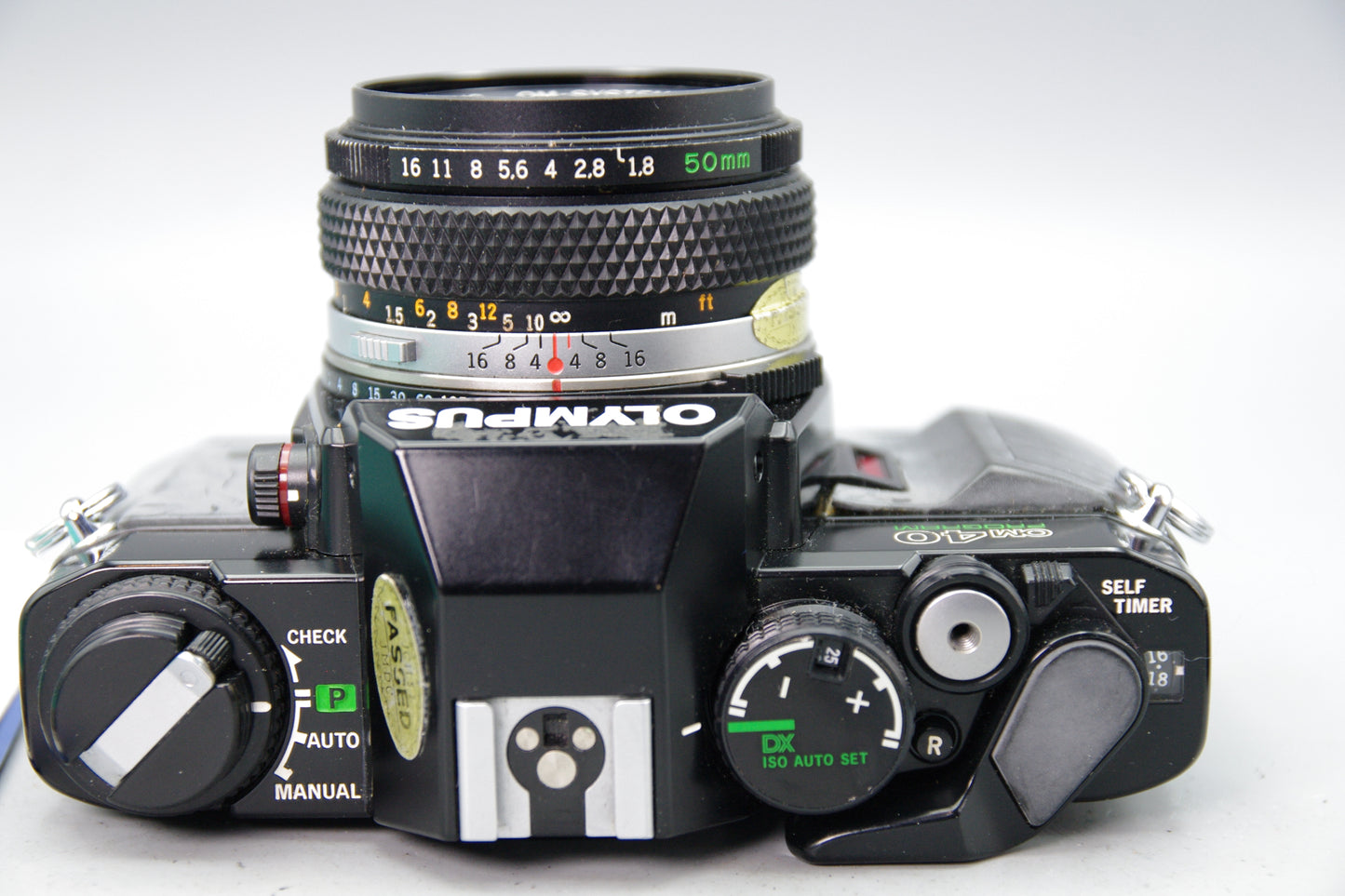Olympus OM40 Program 35mm SLR Camera with 50mm Lens and Instructions – Very Good