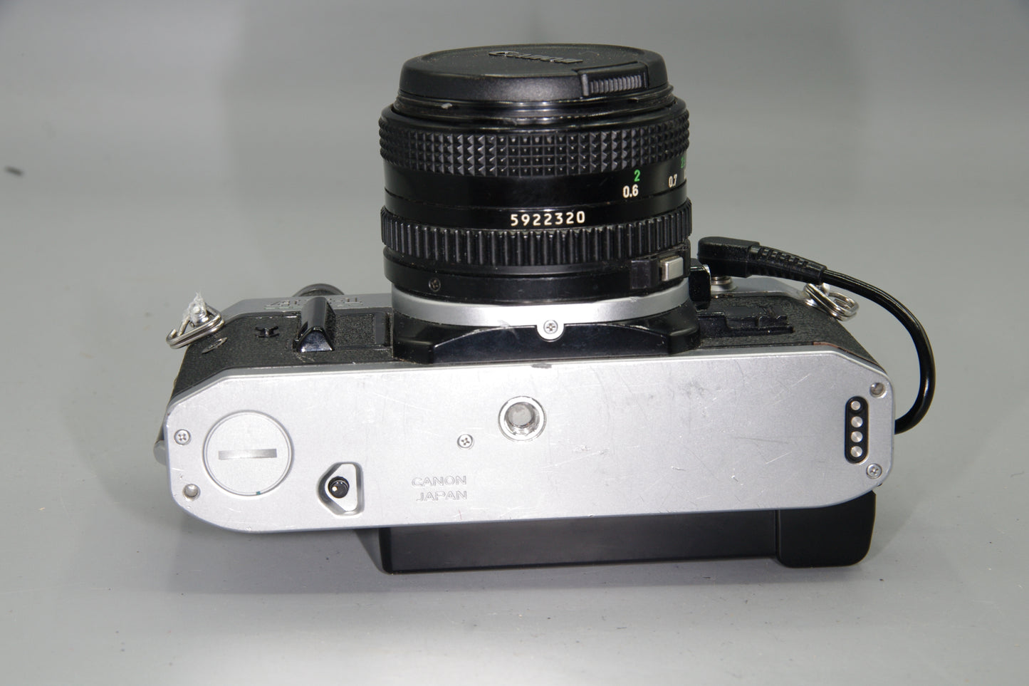 Canon AE‑1 Program 35mm SLR + FD 50mm f/1.8 Lens + Data Back A