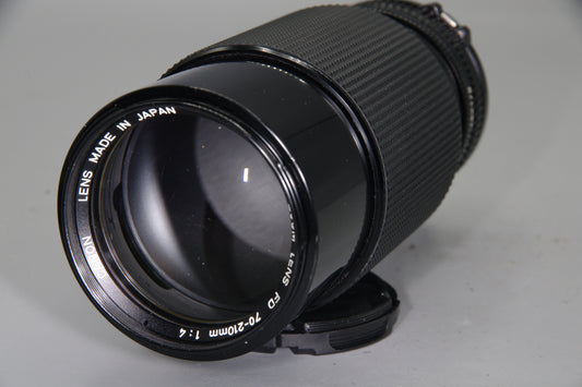 Canon FD 70–210mm f/4 Telephoto zoom with macro, constant f/4 – excellent shape.