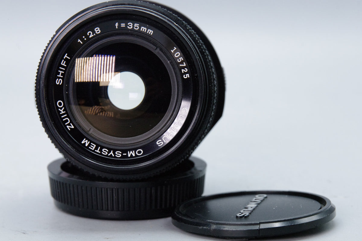 Olympus Zuiko Shift 35mm f/2.8 Lens – OM Mount – Excellent – With Both Caps