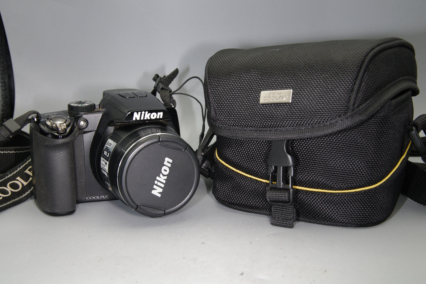 Nikon Coolpix P100 Digital Camera with Battery and Case