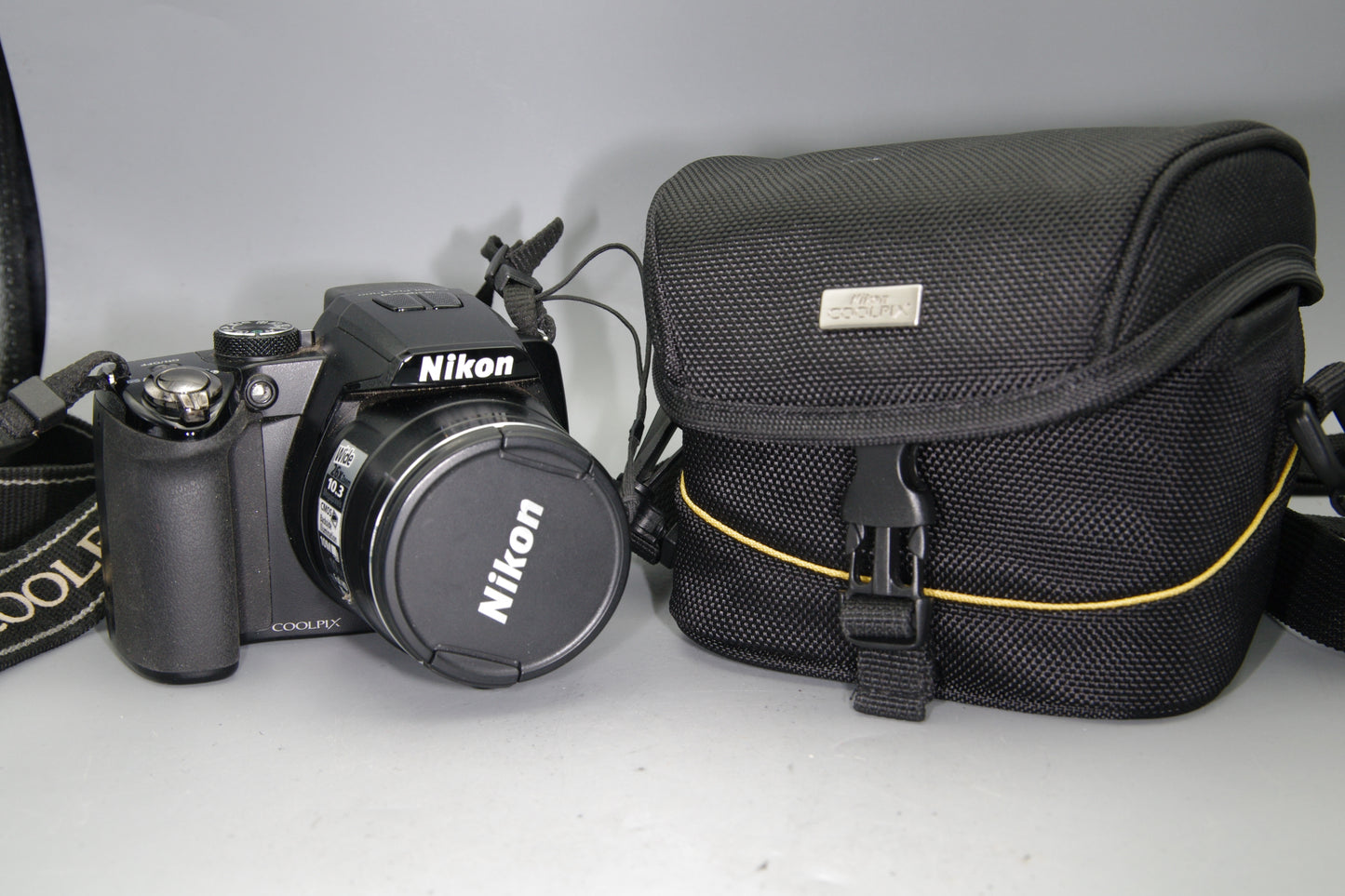 Nikon Coolpix P100 Digital Camera with Battery and Case