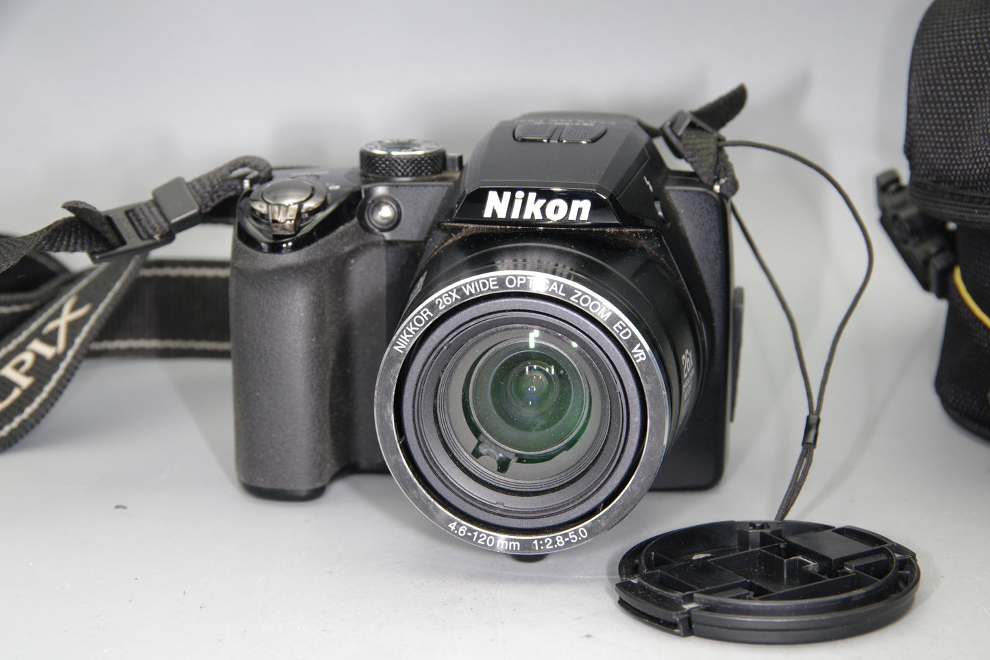 Nikon Coolpix P100 Digital Camera with Battery and Case