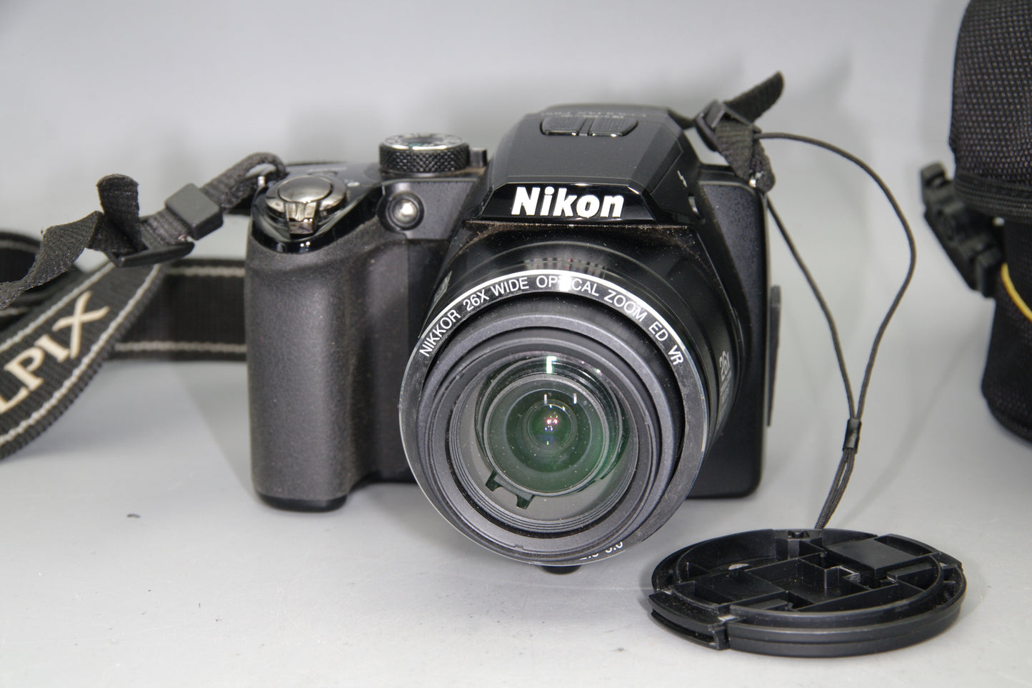 Nikon Coolpix P100 Digital Camera with Battery and Case