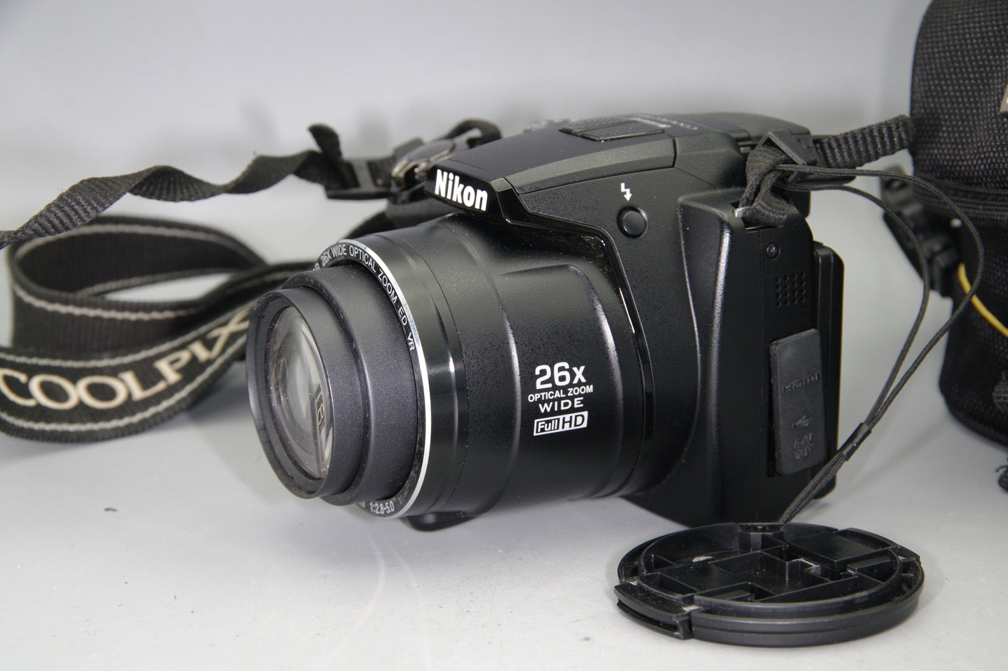 Nikon Coolpix P100 Digital Camera with Battery and Case