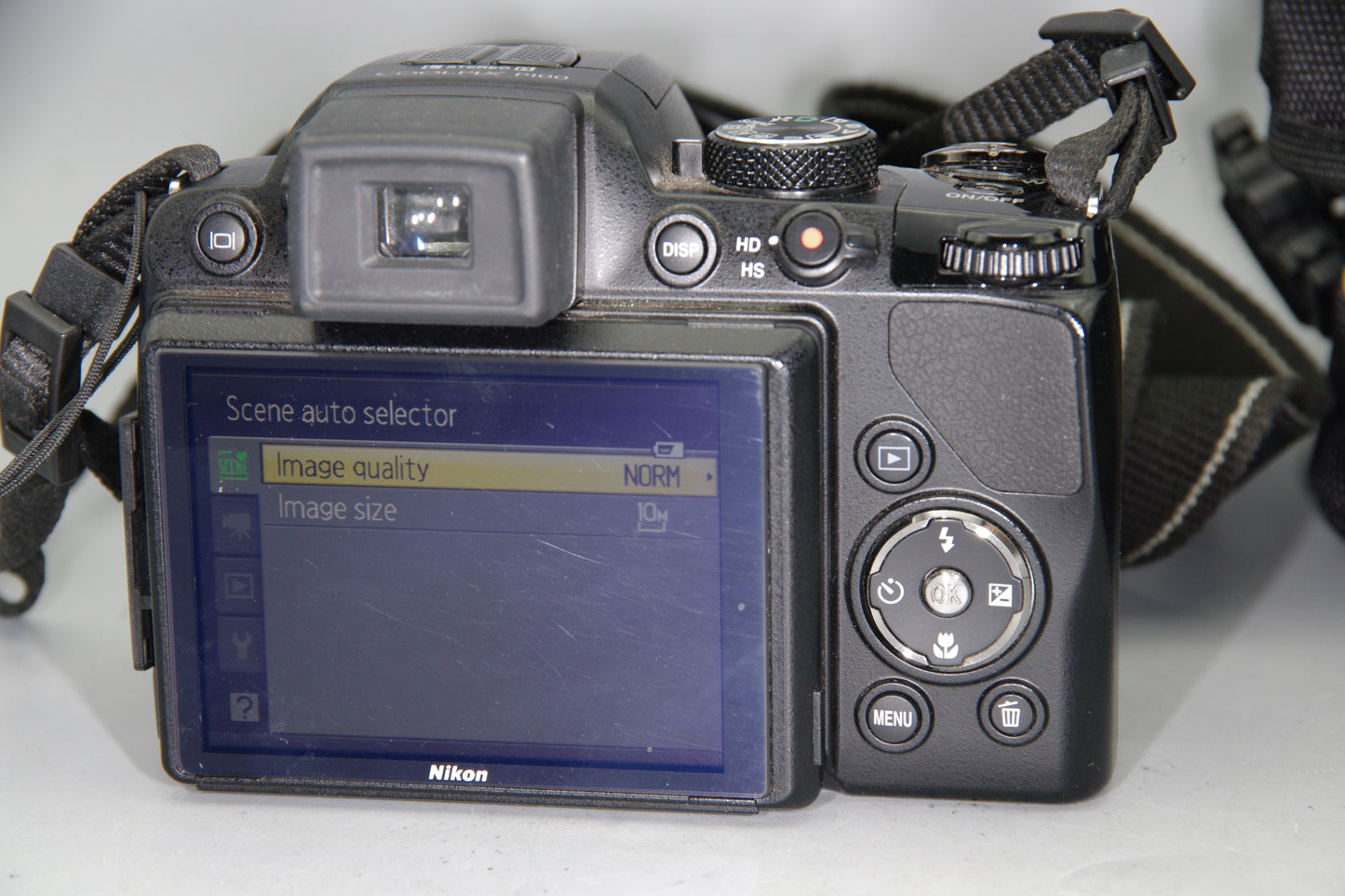 Nikon Coolpix P100 Digital Camera with Battery and Case