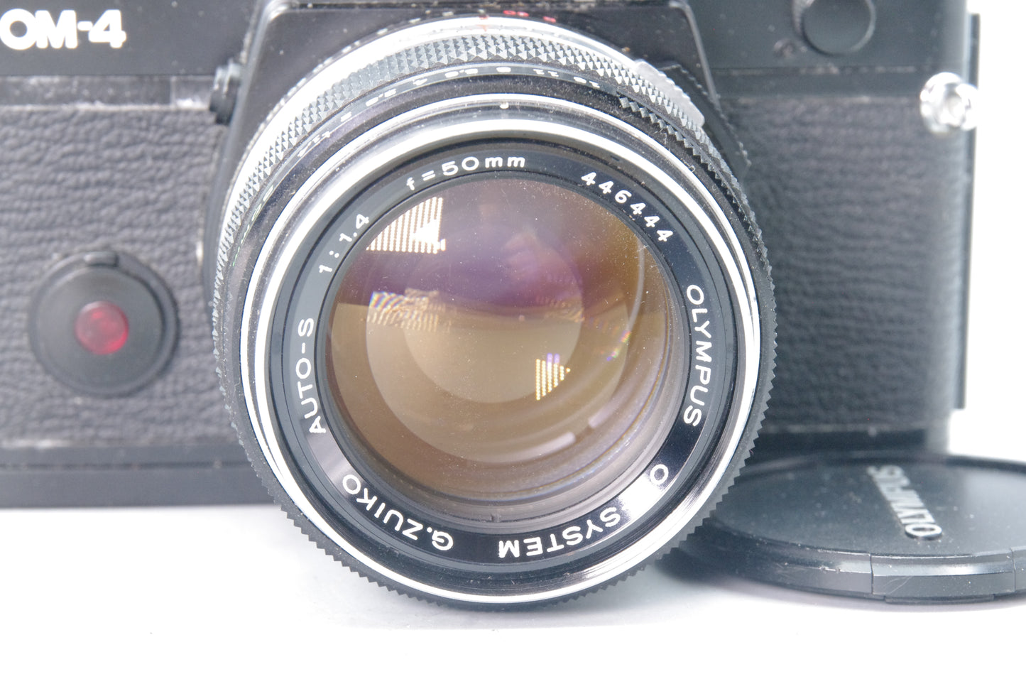 Olympus OM‑4 35mm SLR Camera + G.Zuiko 50mm f/1.4 Lens – Very Good