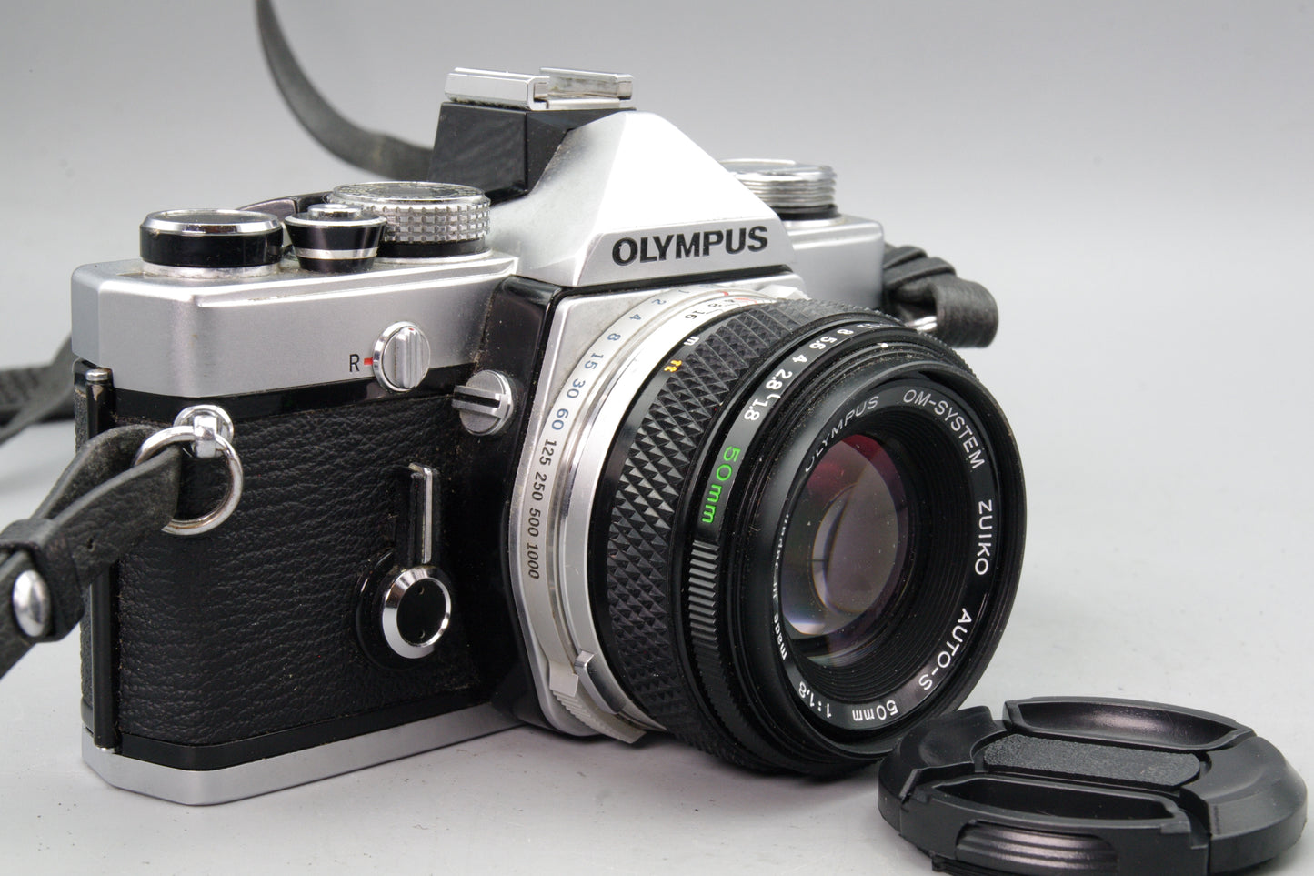 Olympus OM‑1N 35mm SLR Film Camera + Zuiko 50mm f/1.8 Lens – Tested VGC