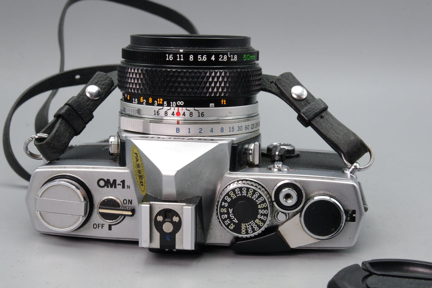 Olympus OM‑1N 35mm SLR Film Camera + Zuiko 50mm f/1.8 Lens – Tested VGC