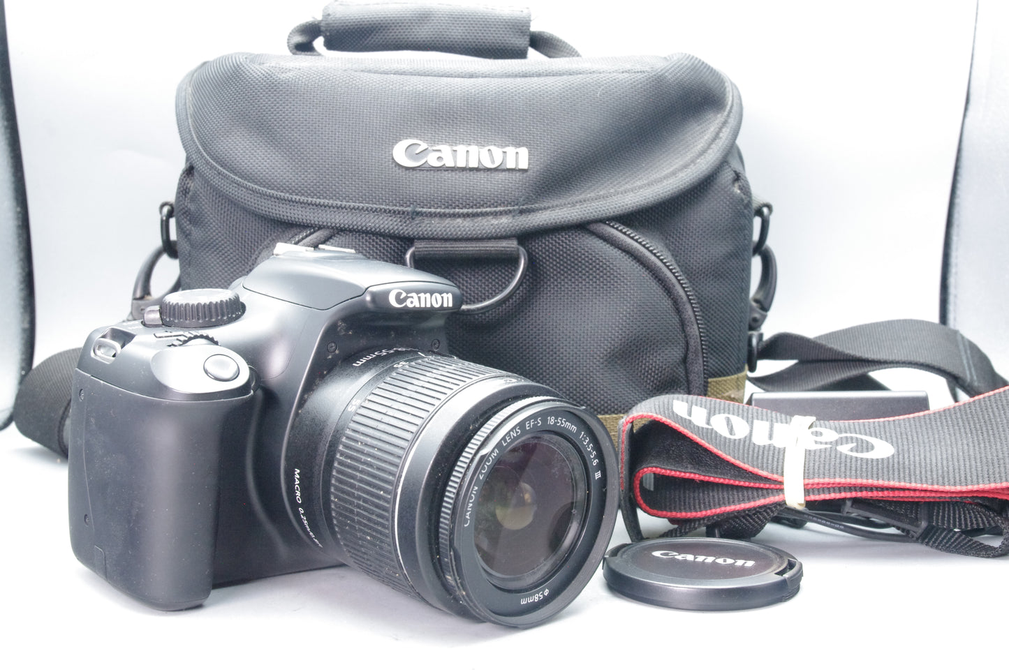 Canon EOS 1100D 12.2MP DSLR + 18‑55mm III Lens – S/C 629 – Charger & Case