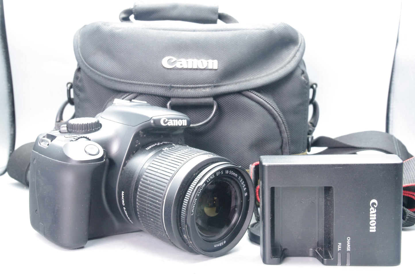 Canon EOS 1100D 12.2MP DSLR + 18‑55mm III Lens – S/C 629 – Charger & Case