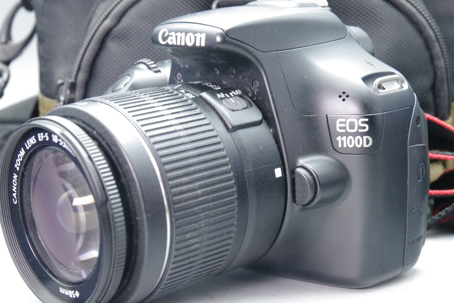 Canon EOS 1100D 12.2MP DSLR + 18‑55mm III Lens – S/C 629 – Charger & Case