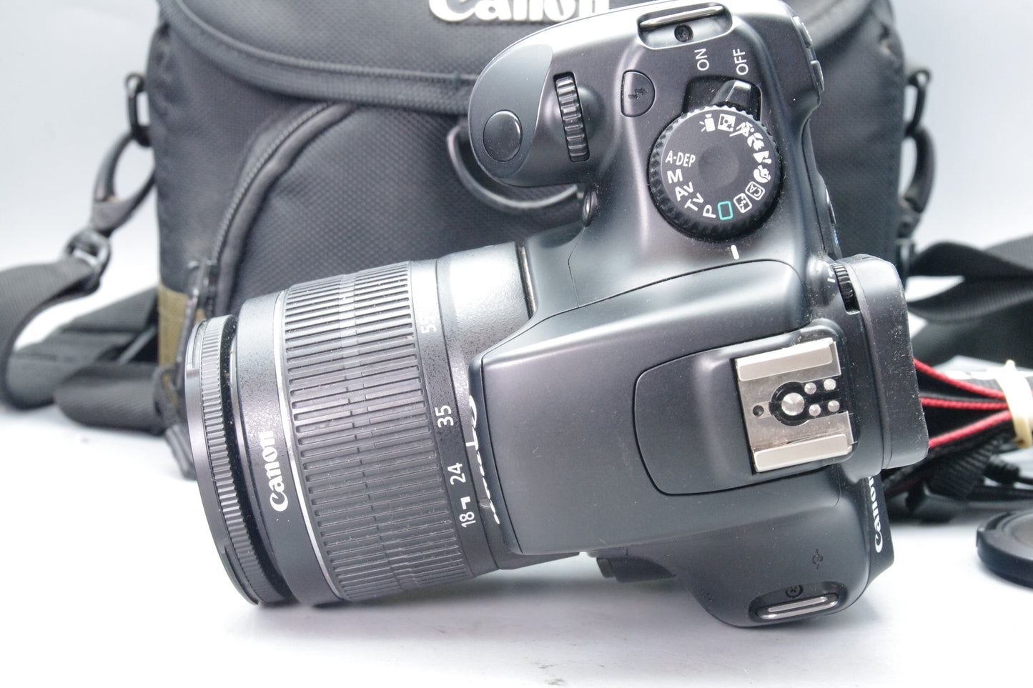 Canon EOS 1100D 12.2MP DSLR + 18‑55mm III Lens – S/C 629 – Charger & Case