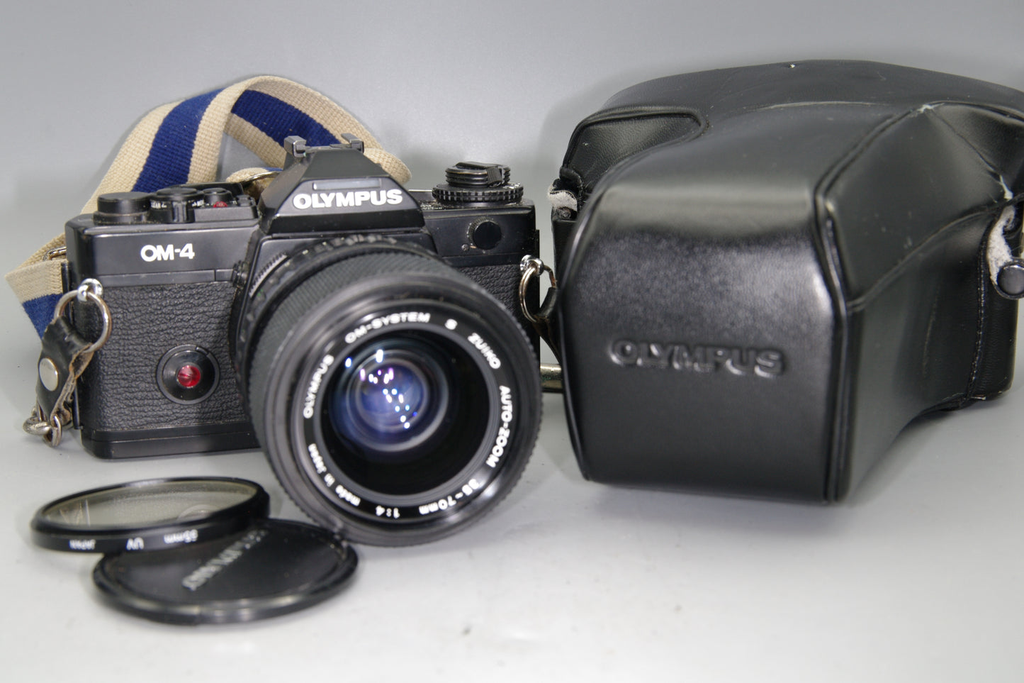 Olympus OM‑4  35mm SLR Film Camera with Zuiko 35–70mm Lens & Case -Excellent