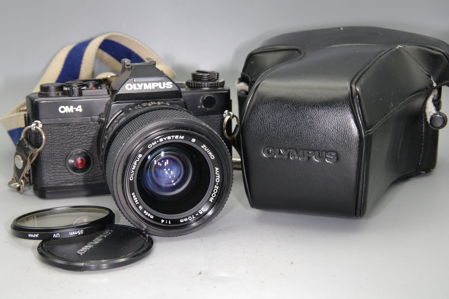 Olympus OM‑4  35mm SLR Film Camera with Zuiko 35–70mm Lens & Case -Excellent