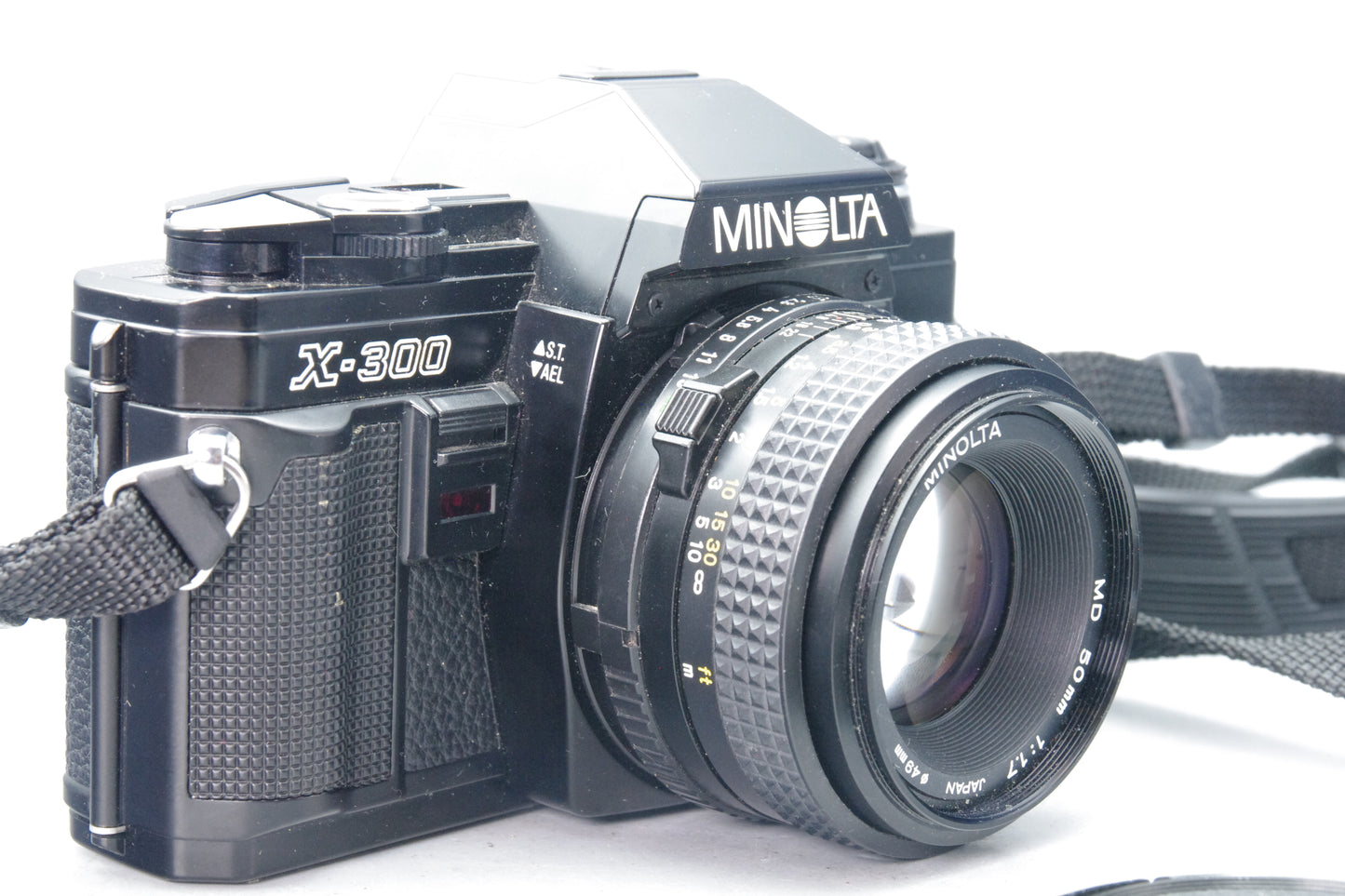 Minolta X‑300 35mm SLR with MD 50mm f/1.7 Lens – Excellent – Black