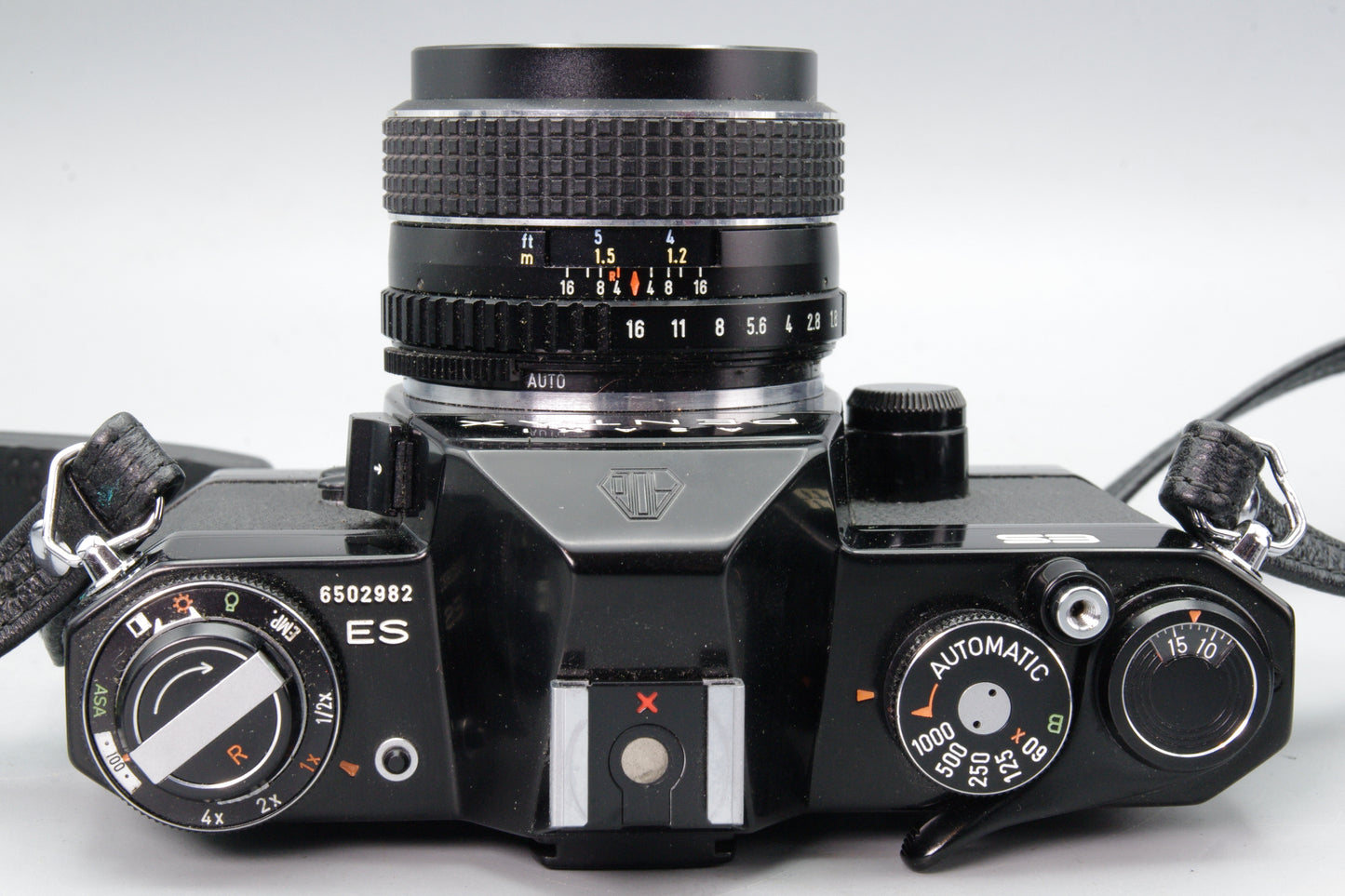 Pentax ES 35mm SLR with SMC Takumar 55mm f/1.8 Lens + Half Case – Near Mint