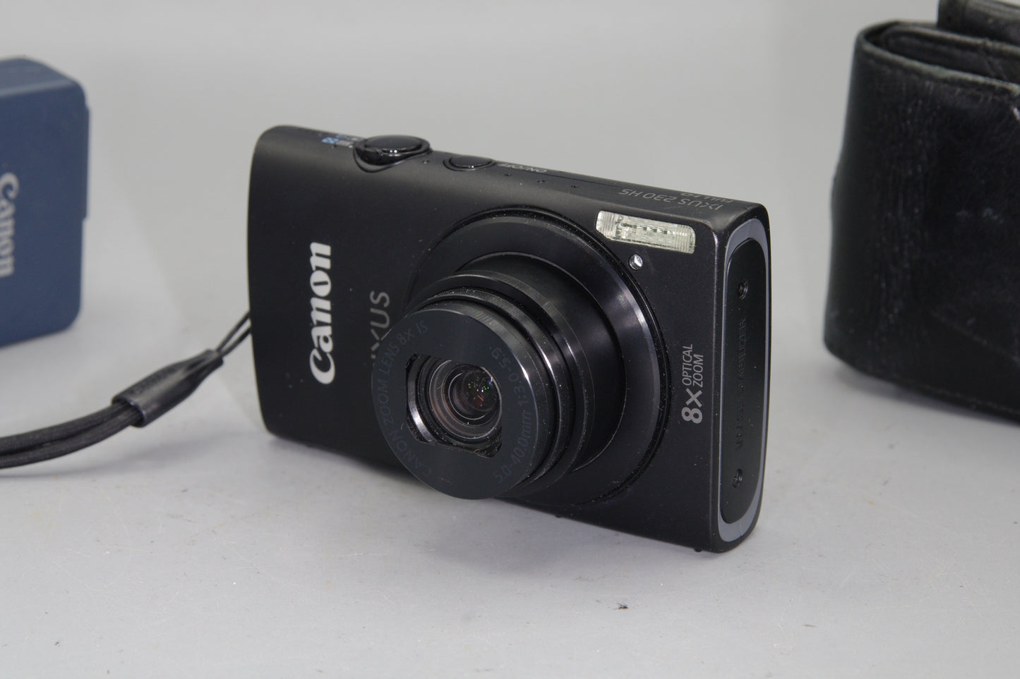 Canon IXUS 230HS 12.1MP Digital Camera with case and charger - Excellent