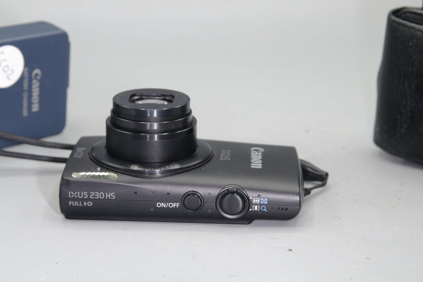 Canon IXUS 230HS 12.1MP Digital Camera with case and charger - Excellent