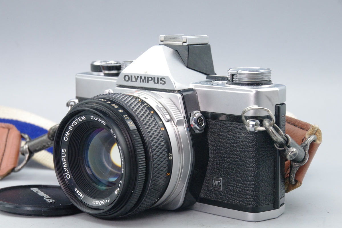 Olympus OM‑1N 35mm SLR Film Camera + Zuiko 50mm f/1.8 Lens – Tested EXC