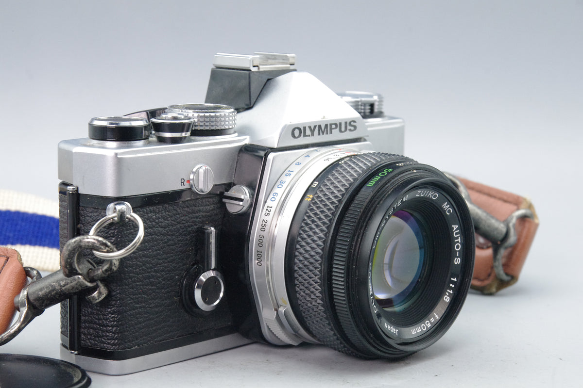 Olympus OM‑1N 35mm SLR Film Camera + Zuiko 50mm f/1.8 Lens – Tested EXC