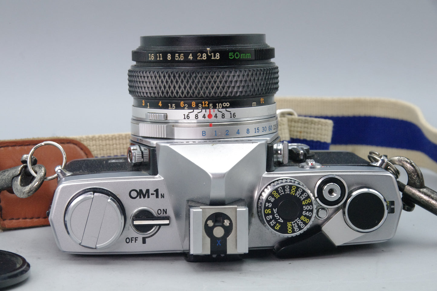 Olympus OM‑1N 35mm SLR Film Camera + Zuiko 50mm f/1.8 Lens – Tested EXC