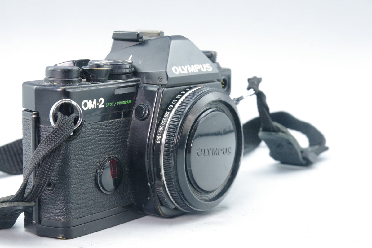 Olympus OM‑2 Spot/Program 35mm SLR Body – New Batteries – Very Good Condition