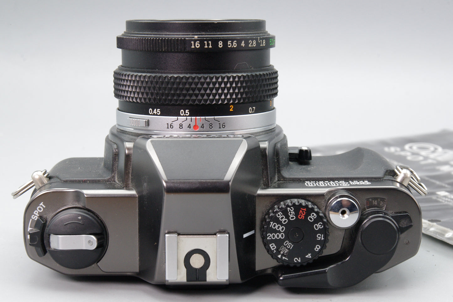 Olympus OM2000 SLR with 50mm f/1.8 Auto‑S Lens – Spot Metering – Excellent