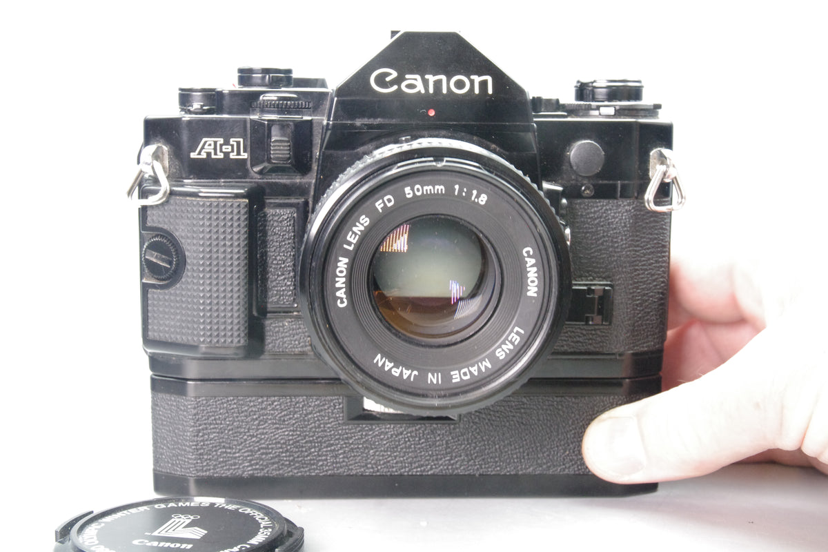 Canon A-1 35mm SLR with FD 50mm f/1.8 Lens  + Motor drive - Tested & Working