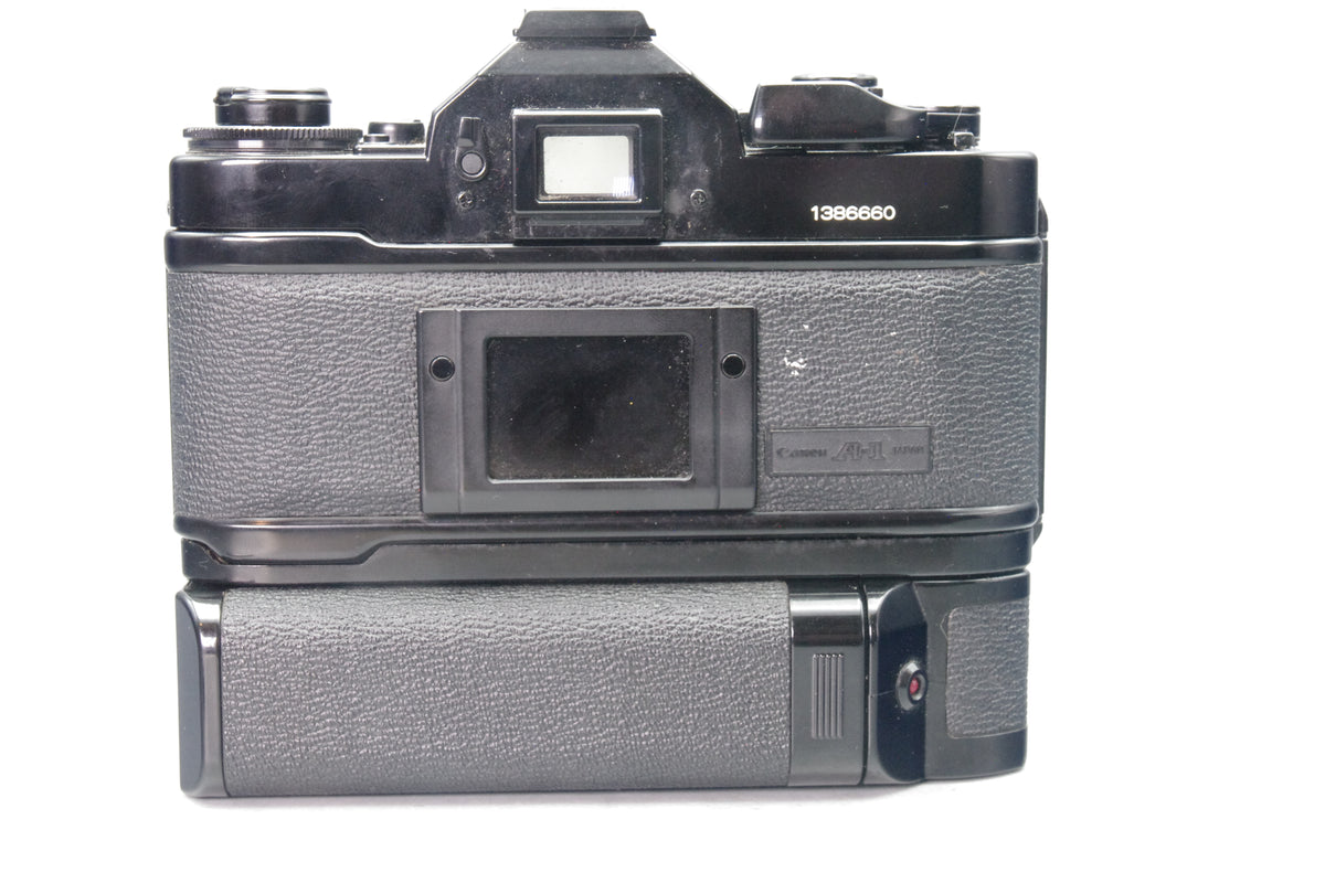 Canon A-1 35mm SLR with FD 50mm f/1.8 Lens  + Motor drive - Tested & Working