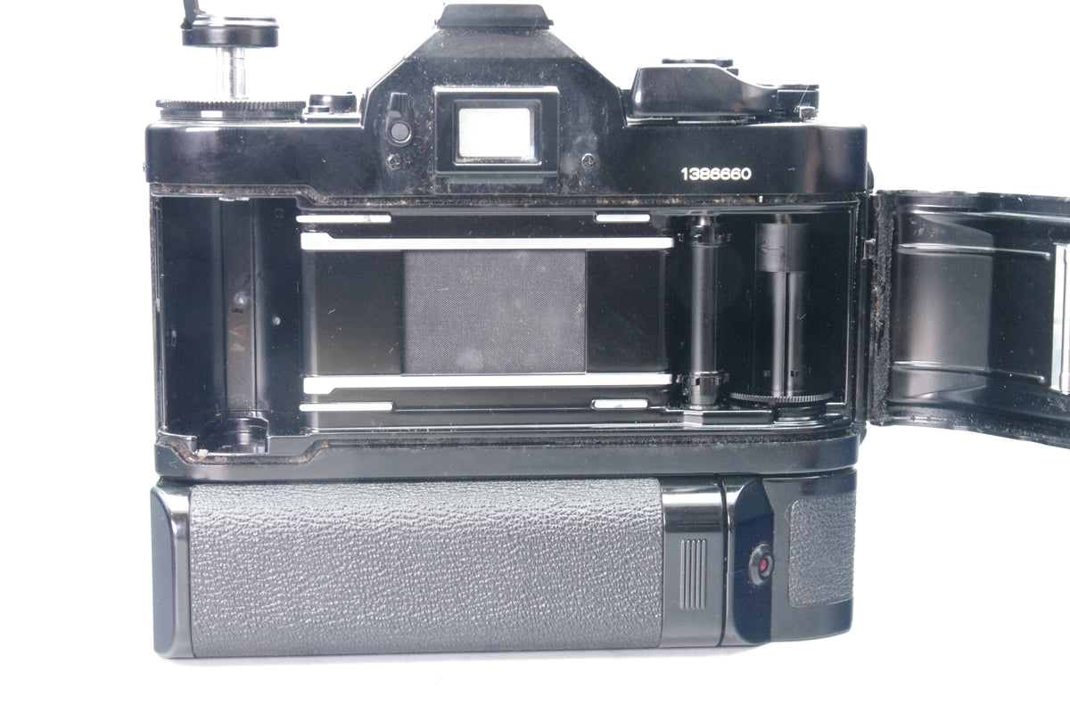 Canon A-1 35mm SLR with FD 50mm f/1.8 Lens  + Motor drive - Tested & Working