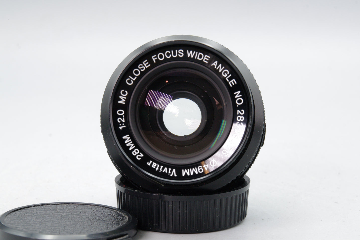 Vivitar 28mm f/2.0 Close Focus Wide Angle Lens – OM Mount – Very Good Haze