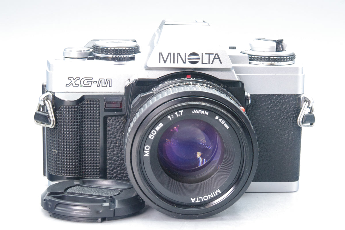 Minolta XG‑M 35mm SLR + MD 50mm f/1.7 Lens, Case &amp; Batteries – Excellent