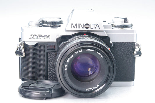 Minolta XG‑M 35mm SLR + MD 50mm f/1.7 Lens & Batteries – Excellent