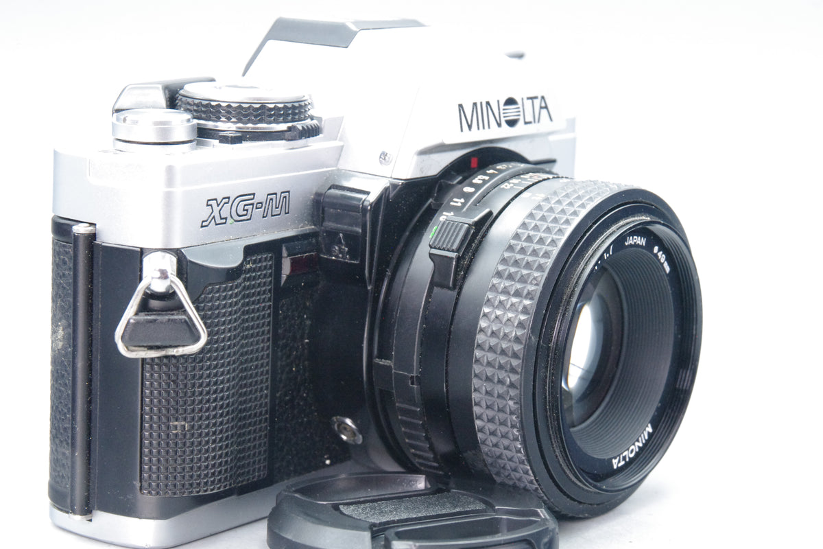 Minolta XG‑M 35mm SLR + MD 50mm f/1.7 Lens, Case &amp; Batteries – Excellent